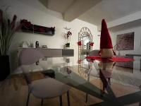A seating area at Maison del Ducato Cavour 37