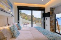 Posteľ alebo postele v izbe v ubytovaní Majestic View Villas