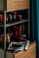 a cupboard with a coffee pot and a newspaper at Villa Marquis Member of Meliá Collection in Paris