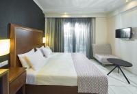 A bed or beds in a room at Mediterranean Resort