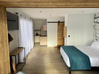 Posteľ alebo postele v izbe v ubytovaní Appart Hôtel Le JAS