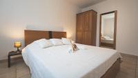 Posteľ alebo postele v izbe v ubytovaní Maison à Cervione Prunete jardin piscine accès direct plage