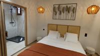 Posteľ alebo postele v izbe v ubytovaní Intense Boutik-Hôtel