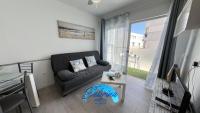 Część wypoczynkowa w obiekcie Grazioso appartamento al Bristol Sunset Vista