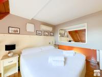 Posteľ alebo postele v izbe v ubytovaní COZY COTTAGE by Design Studio