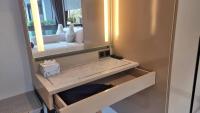 Postel nebo postele na pokoji v ubytování B207-Hi-Ended Pool Access 1br 300m 2 Ao Nang Beach