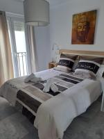 Posteľ alebo postele v izbe v ubytovaní Encantador apartamento residencial con piscina