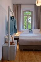 Postel nebo postele na pokoji v ubytování Eressian Hotel & Hammam Spa