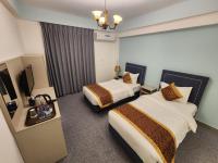 Aquavista Hotel & Suitesにあるベッド