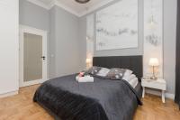 Posteľ alebo postele v izbe v ubytovaní Warszawa Ochota Modern Apartment for Families by Noclegi Renters