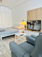 A television and/or entertainment centre at Apartmán Liptov NP9