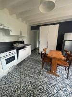 Kuchnia lub aneks kuchenny w obiekcie Gîte Les Roches d'Étigues