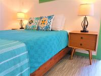 A bed or beds in a room at Waterside Inn