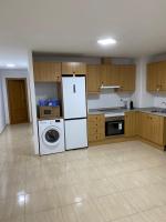 Kuchyň nebo kuchyňský kout v ubytování Apartamentos Wei
