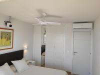 A bed or beds in a room at BEACHFRONT -- NEW LUXURY Apartment -- 1ª Linea Playa -- Fuengirola CITY CENTER -- Private PARKING -- Panoramic Sea Views --