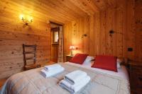 Posteľ alebo postele v izbe v ubytovaní Chalet de l'Alpage - Happy Rentals