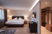 Łóżko lub łóżka w pokoju w obiekcie Stadthotel Goldenes Schiff