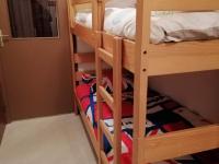 a couple of bunk beds in a room at Appartement Les Adrets-Prapoutel, 1 pièce, 4 personnes - FR-1-557-108 in Les Adrets