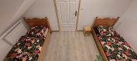Posteľ alebo postele v izbe v ubytovaní Bacio-Bacio Apartamenty