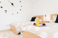 A bed or beds in a room at AT Trajano 6