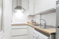 A kitchen or kitchenette at AT Trajano 6