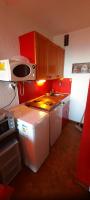 Kuchnia lub aneks kuchenny w obiekcie LE BARCARES 50M PLAGE