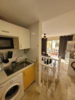 Kuchyň nebo kuchyňský kout v ubytování Apartament CALETA