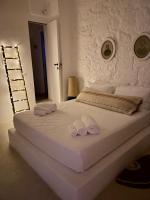 A bed or beds in a room at Corte Manfredi