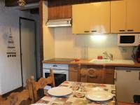Kuchnia lub aneks kuchenny w obiekcie Appartement familial avec mezzanine, 7 couchages, proche pistes et commerces à Vars - FR-1-330B-203