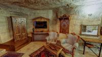 TV a/nebo společenská místnost v ubytování Chelebi Cave House