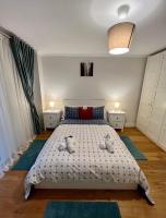 Apartamentos Prestige Suites Málaga IIIにあるベッド
