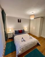 Apartamentos Prestige Suites Málaga IIIにあるベッド
