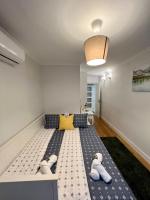 Apartamentos Prestige Suites Málaga IIIにあるベッド