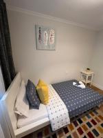 Apartamentos Prestige Suites Málaga IIIにあるベッド