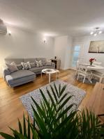 Apartamentos Prestige Suites Málaga IIIにあるシーティングエリア
