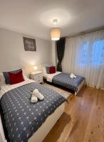 Apartamentos Prestige Suites Málaga IIIにあるベッド