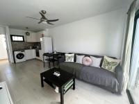 Posedenie v ubytovaní Casa Feliz - one bedroom central apartment with communal pool