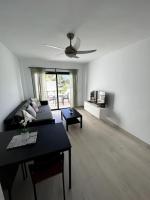 Televízia a/alebo spoločenská miestnosť v ubytovaní Casa Feliz - one bedroom central apartment with communal pool