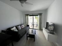 Televízia a/alebo spoločenská miestnosť v ubytovaní Casa Feliz - one bedroom central apartment with communal pool