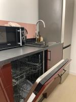 Kuchyň nebo kuchyňský kout v ubytování Apartamenty Na Tatarskiej 4A