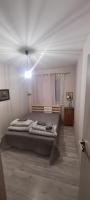 Posteľ alebo postele v izbe v ubytovaní Apartamenty w Starym Kinie
