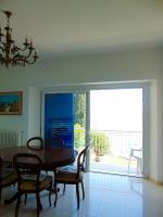 A television and/or entertainment centre at N019 - Numana, prestigioso quadrilocale vista mare