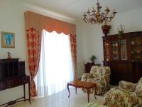 A television and/or entertainment centre at N019 - Numana, prestigioso quadrilocale vista mare