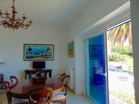 A television and/or entertainment centre at N019 - Numana, prestigioso quadrilocale vista mare