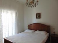 A bed or beds in a room at N019 - Numana, prestigioso quadrilocale vista mare