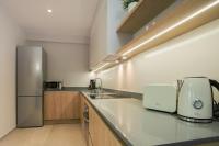 Kuchyňa alebo kuchynka v ubytovaní Celine Luxury Apartments & Suites