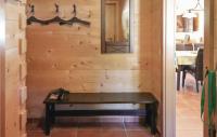 a wooden wall with a bench in a room at Lovely Home In Dalaas With Kitchen in Dalaas