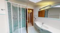A bathroom at Miriam Hotel & Residence