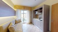 A kitchen or kitchenette at Miriam Hotel & Residence