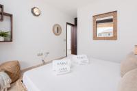 Postel nebo postele na pokoji v ubytování Karat Villa Atlántida
